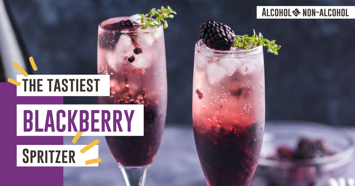 blackberry gin cocktails decorated with fresh blackberries and thyme
