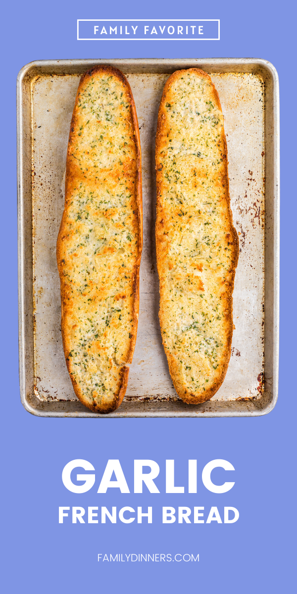 2 halves of a french bread open and toasted with garlic and parmesan