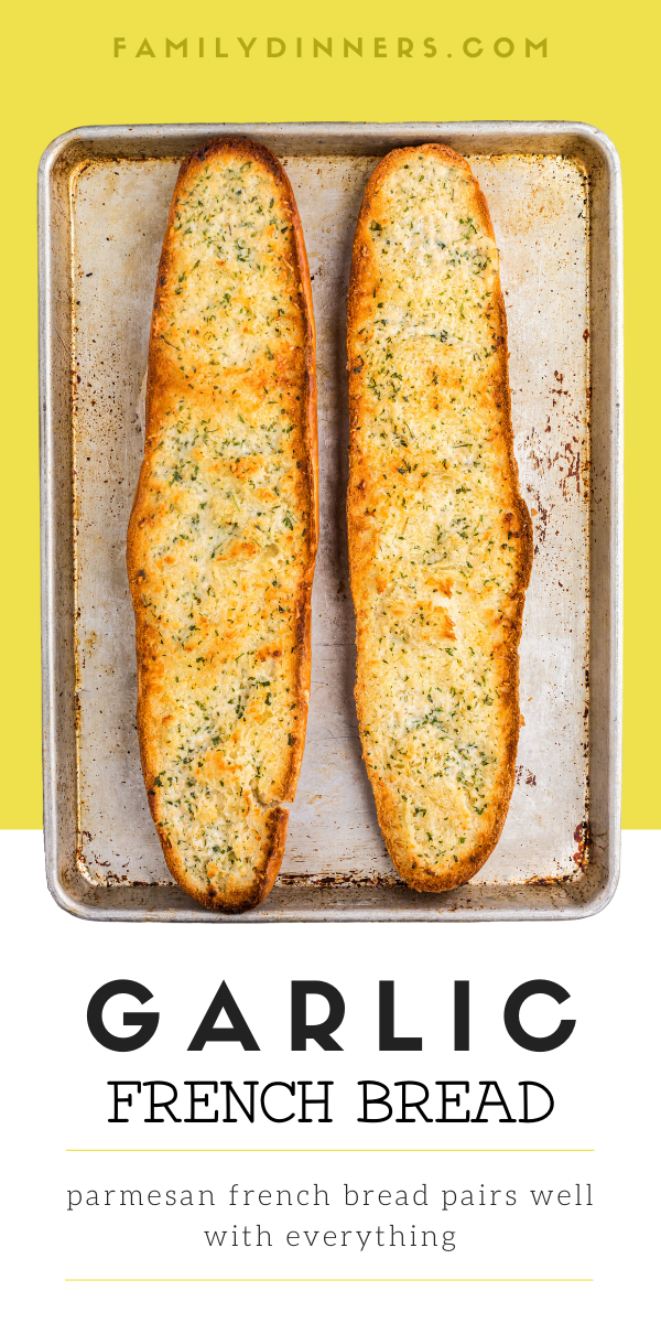 2 halves of a french bread open and toasted with garlic and parmesan