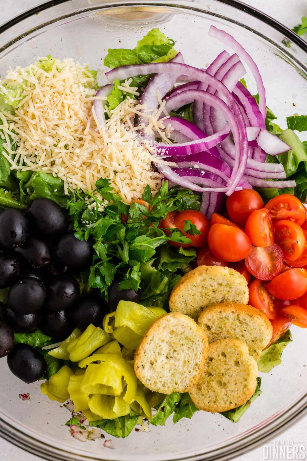 Italian salad ingredients in a bowl.