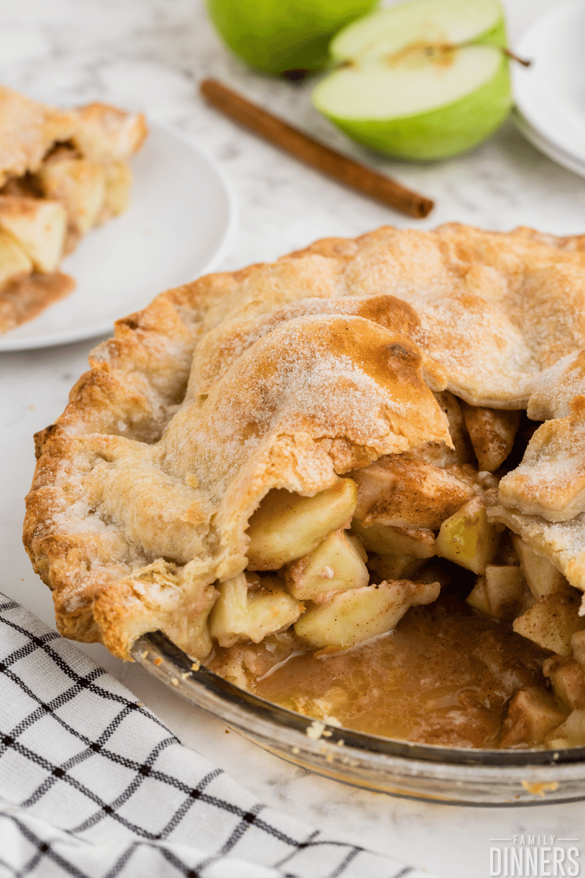 apple pie with a golden pie crust, slice missing