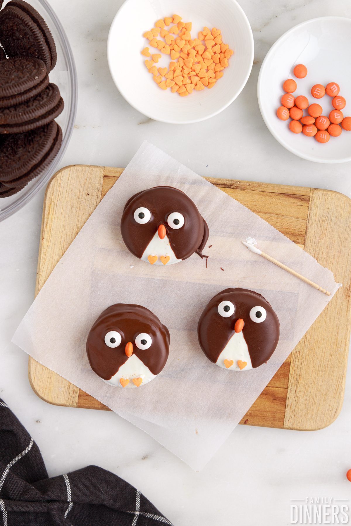 three penguin cookies decorated