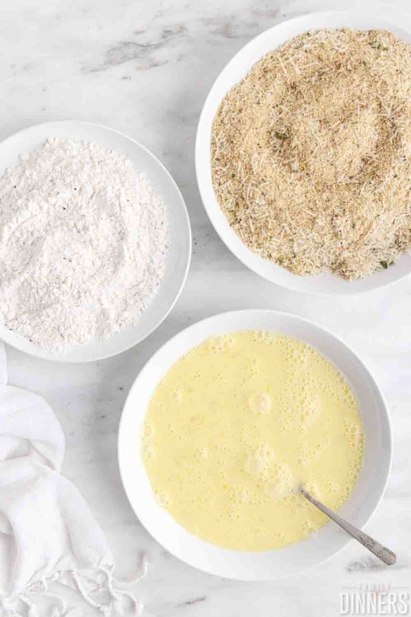 3 shallow bowls of flour mixture, egg wash, breadcrumb mixture
