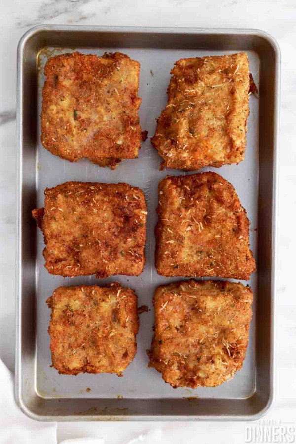 fried pieces of lasagna in a baking dish