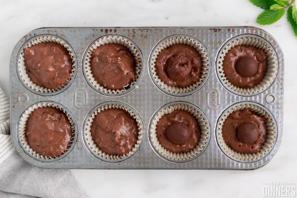 batter filling muffin tin