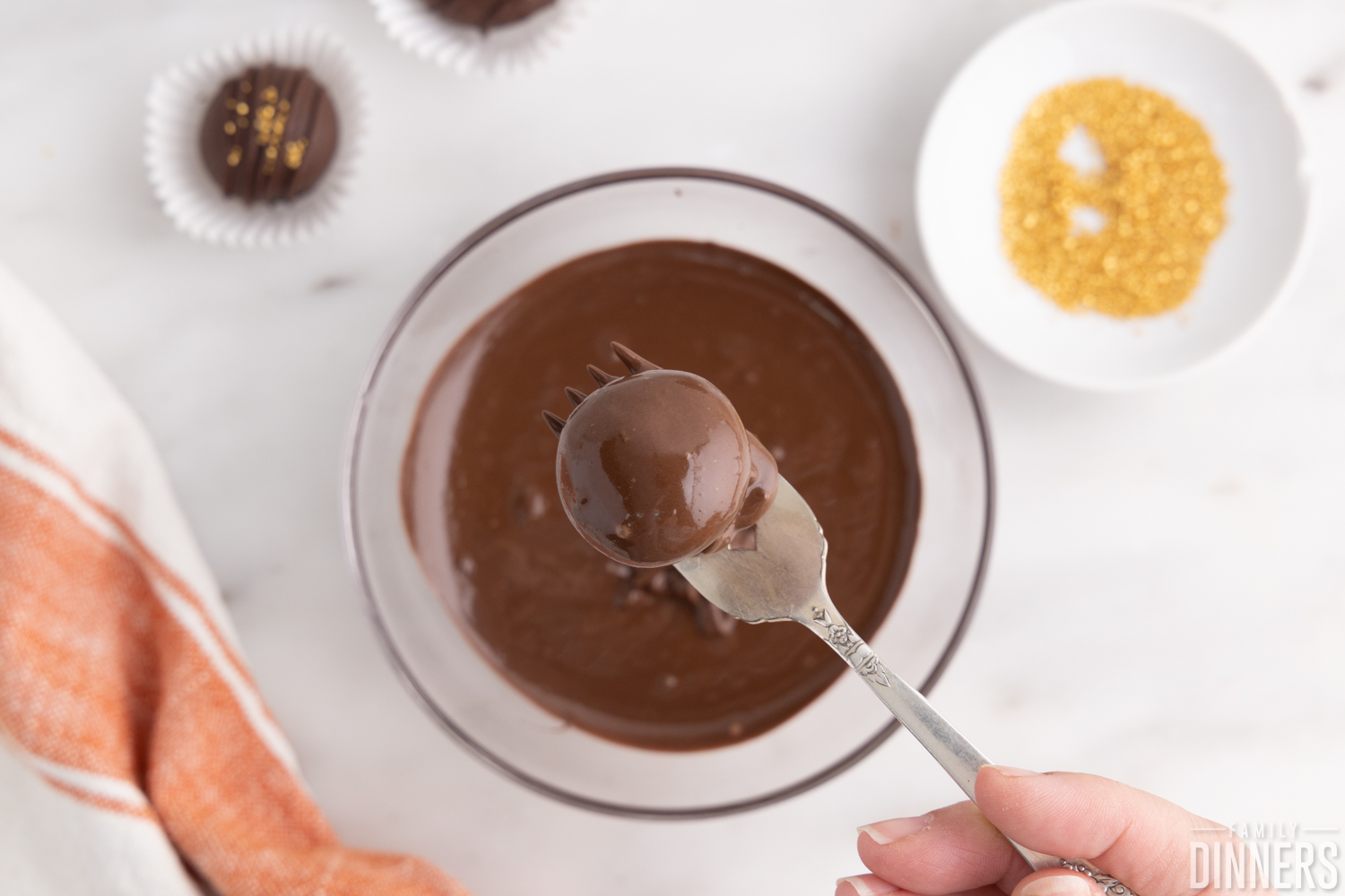 chocolate coated truffle on a fork