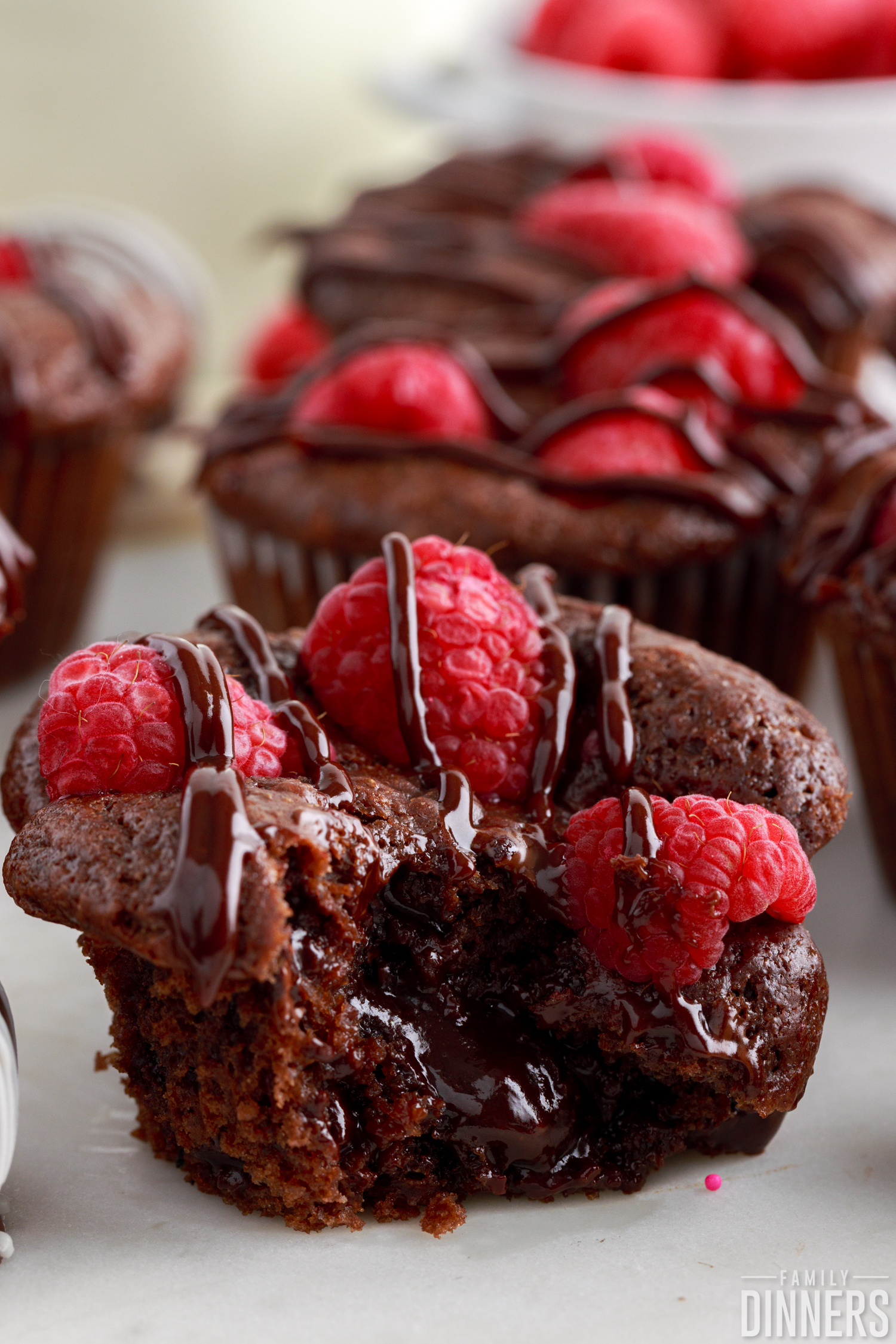 Bite out of chocolate raspberry muffin.