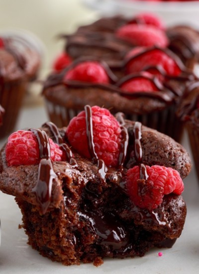 Bite out of chocolate raspberry muffin.