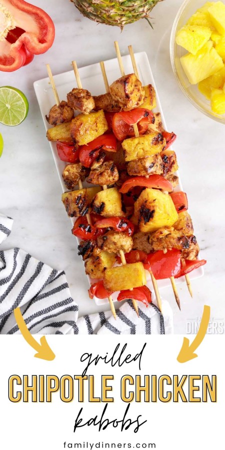 chicken, pineapple, and bell peppers on wooden skewers