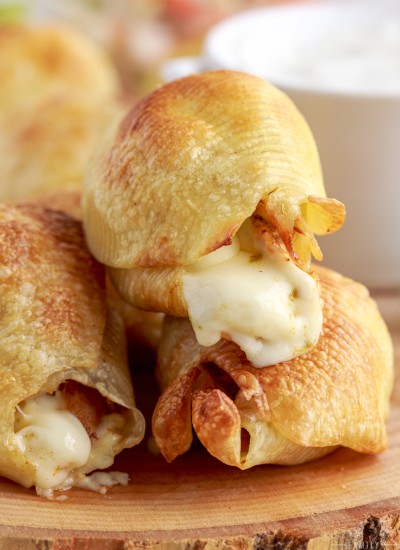 cheese oozing out of air fryer chipotle chicken stuffed pasta shells