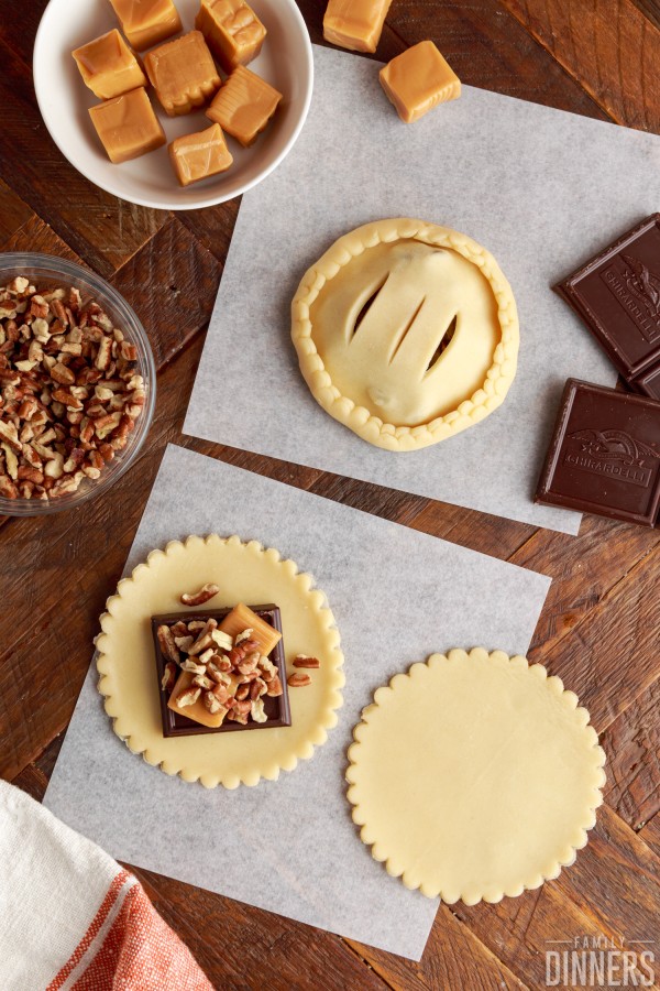 add pecans to top of caramel and chocolate on pie crust