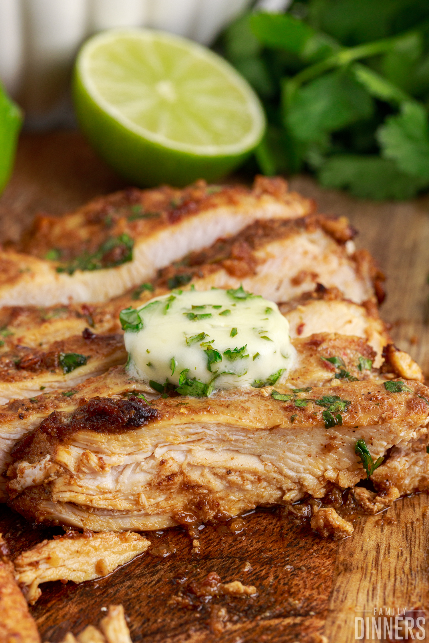 chipotle chicken for burrito bowl topped with cilantro butter