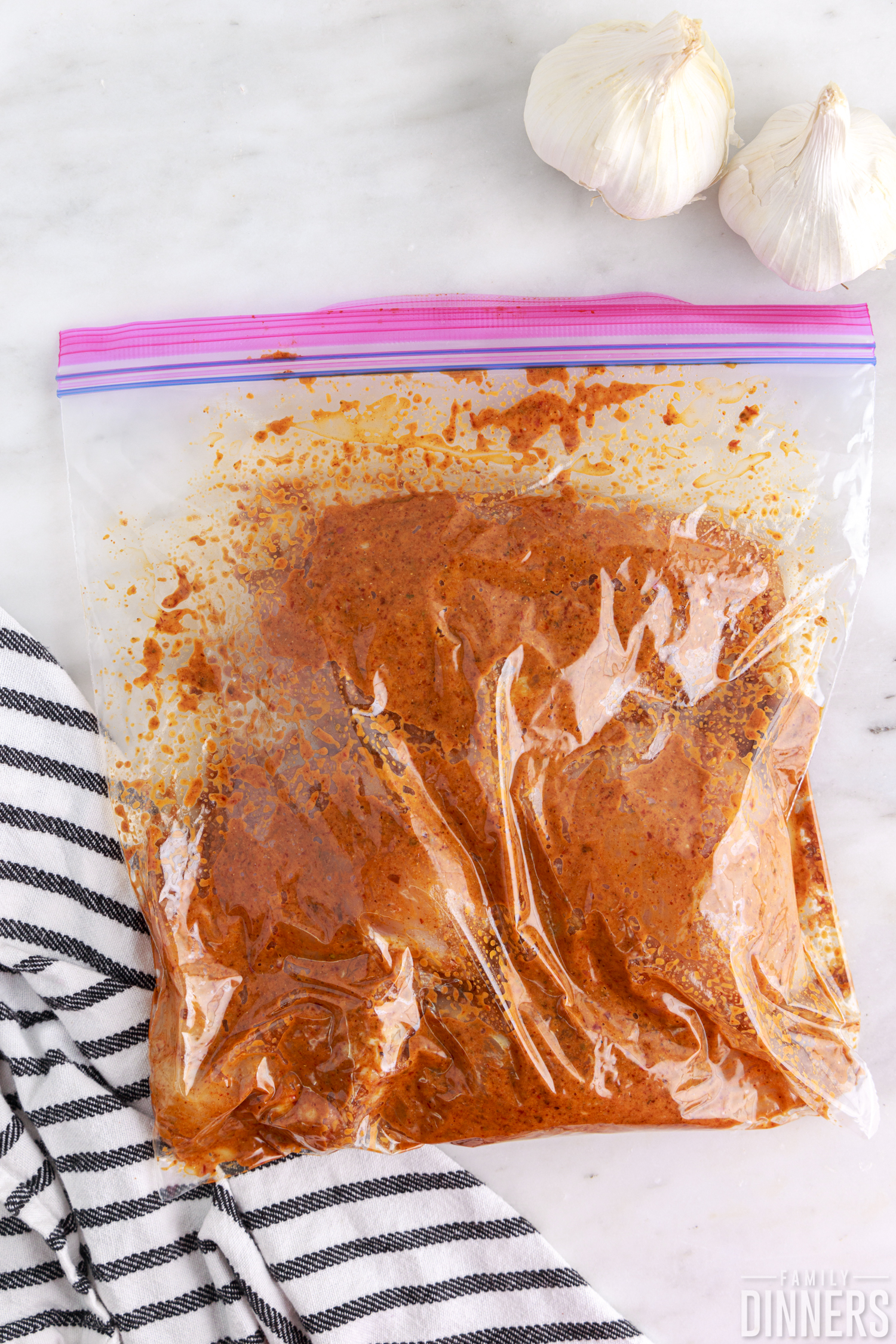 chipotle chicken marinating in a ziploc bag