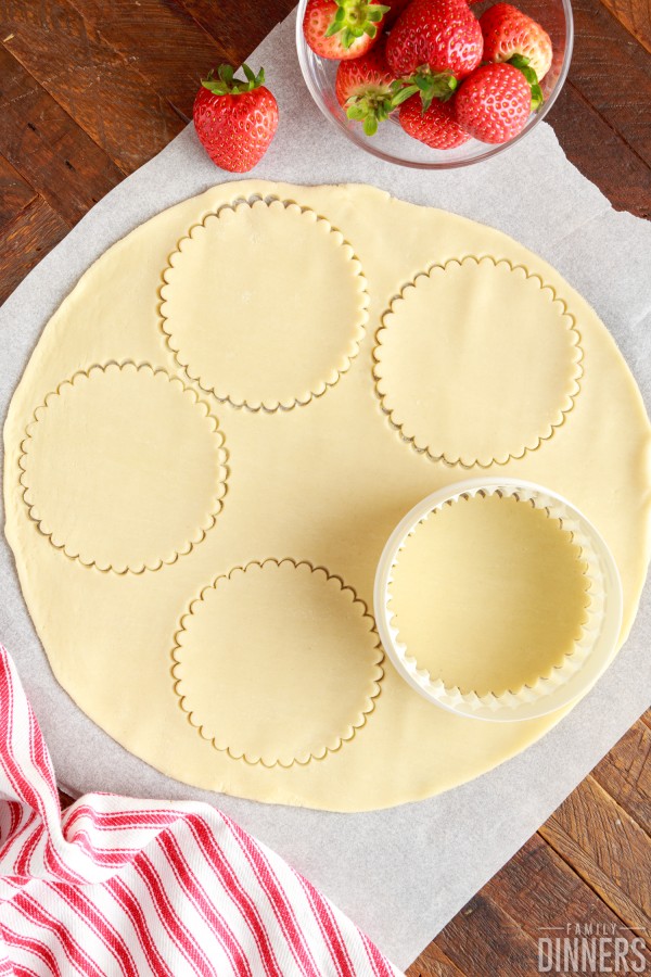 round cutter cutting out pie crust rounds