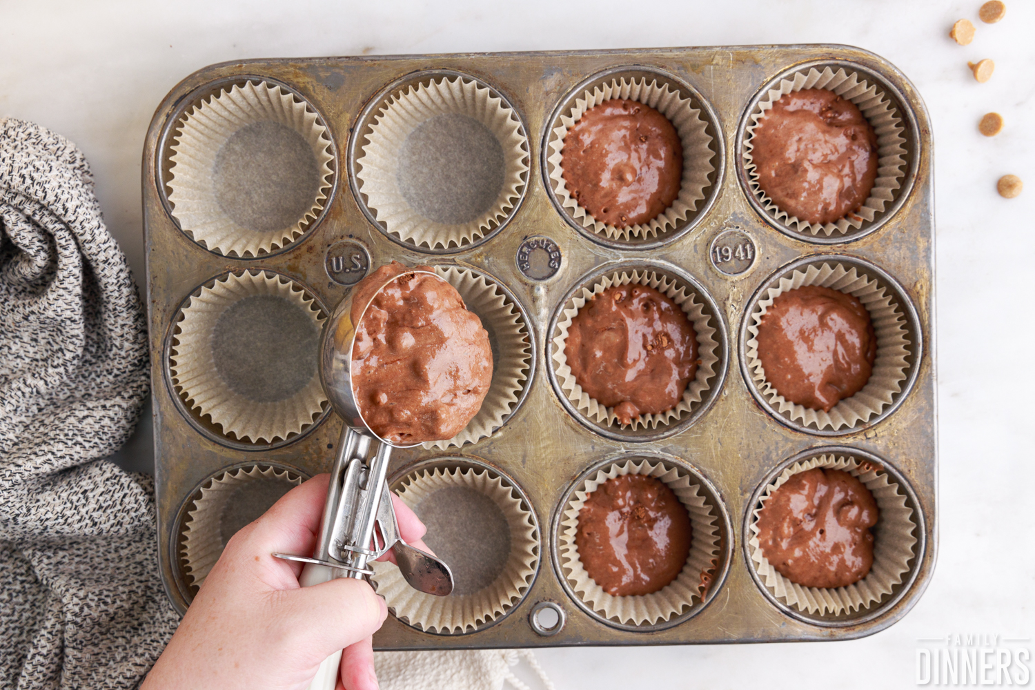 muffin tin with batter in cups