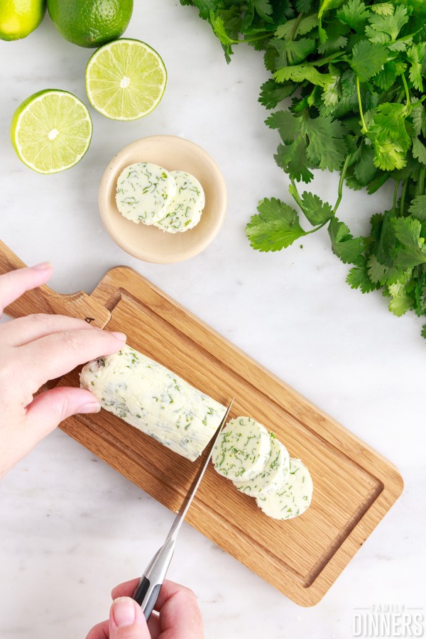cilantro lime butter being cut into slices