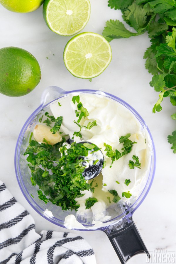 cilantro lime sour cream ingredients in a food processor
