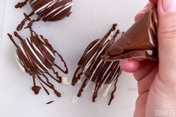 chocolate drizzled over truffle