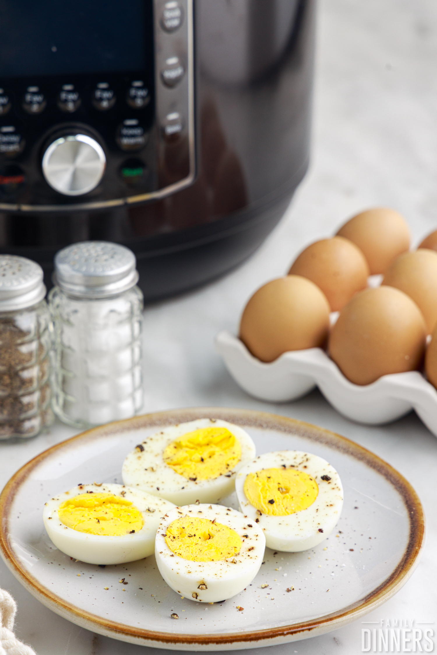 eggs on plate in front of instant pot