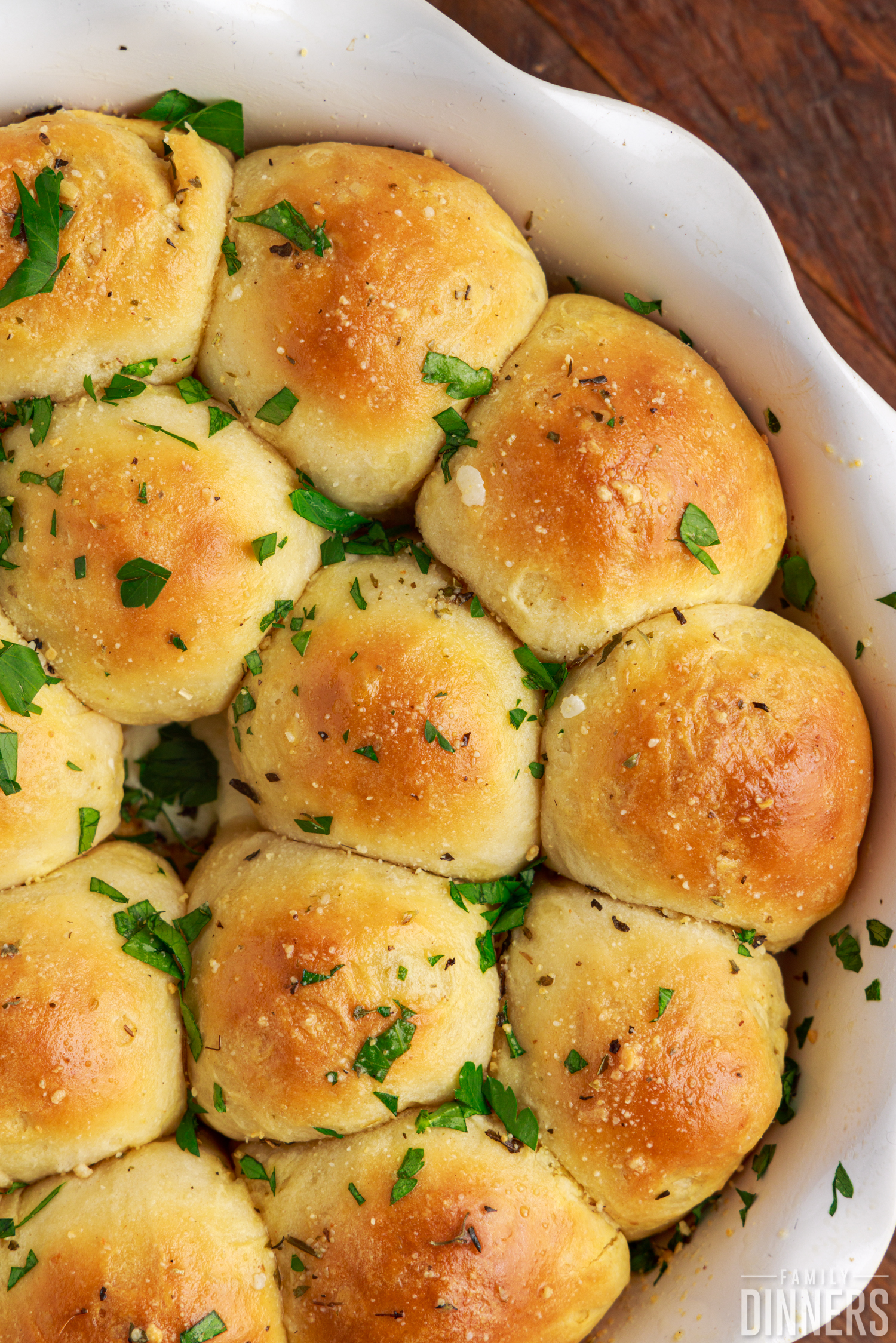 close up of meatball stuffed biscuits in a pie dish