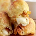 cheese oozing out of chipotle chicken stuffed pasta shells