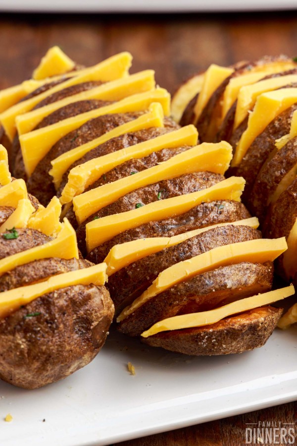 cheese in between hasselback potato slices