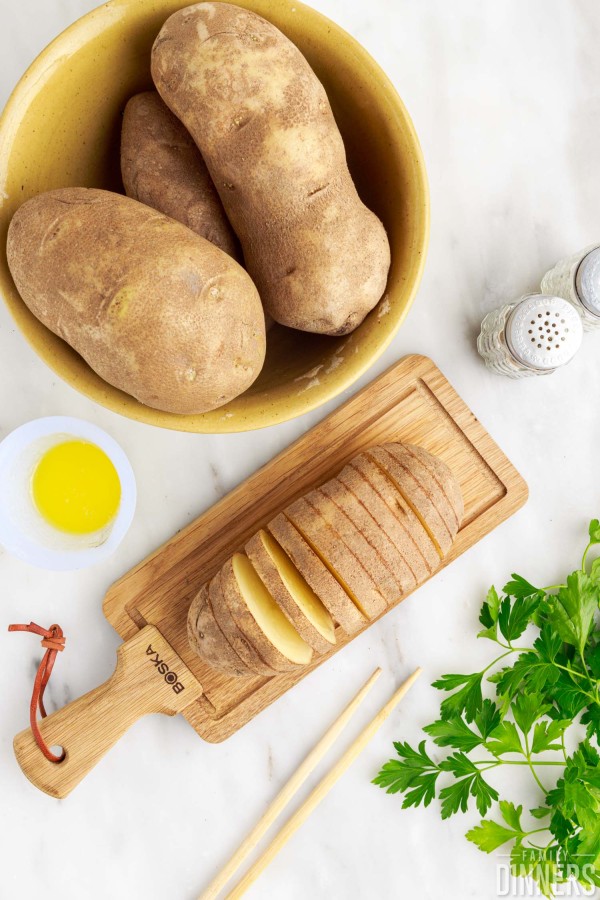knife slicing through potato