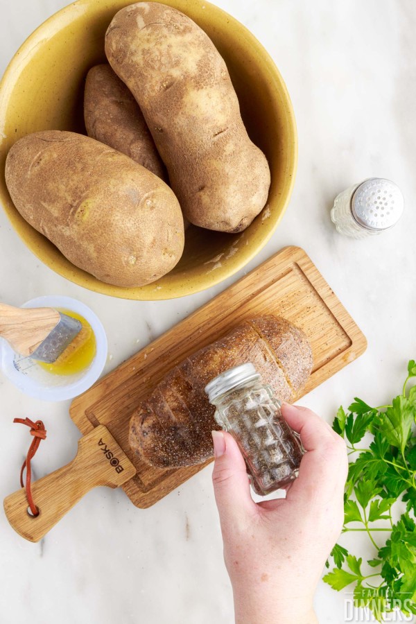 pepper sprinkled on hasselback potato