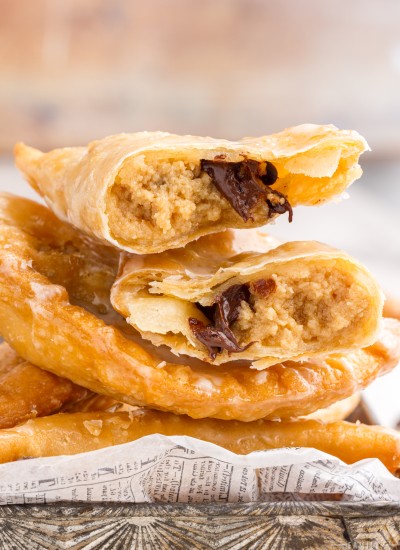 chocolate peanut butter cheesecake hand pies cut open