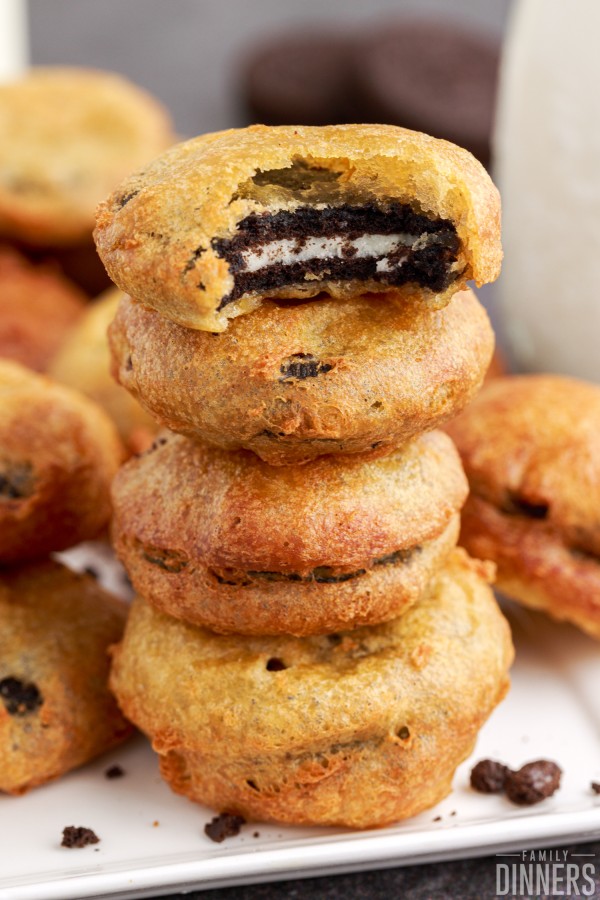 stack of deep fried oreos with bite