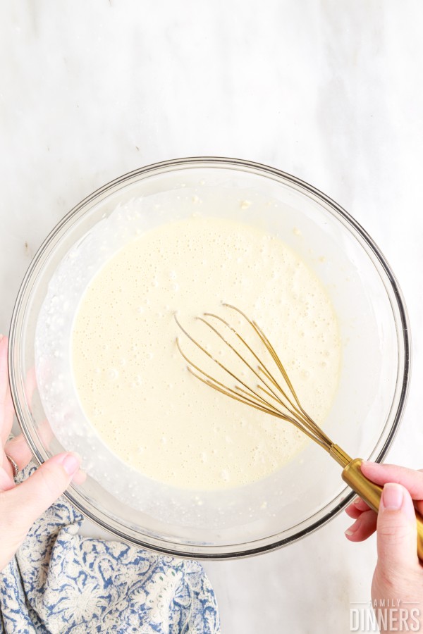 batter ingredients being whisked