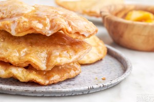 pile of ready to eat peach hand pies on a plate