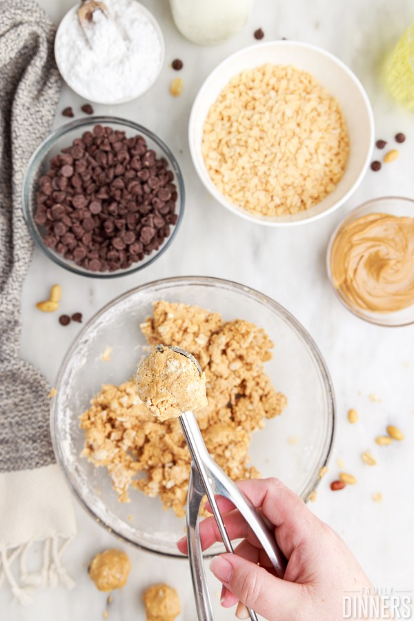 melon baller spoon scooping up peanut butter ball batter