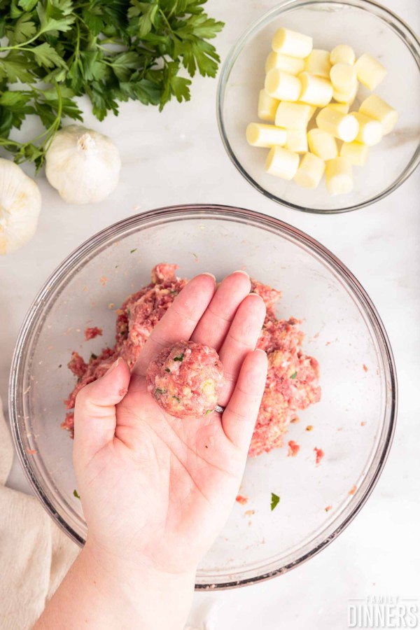 round meatball in palm of hand