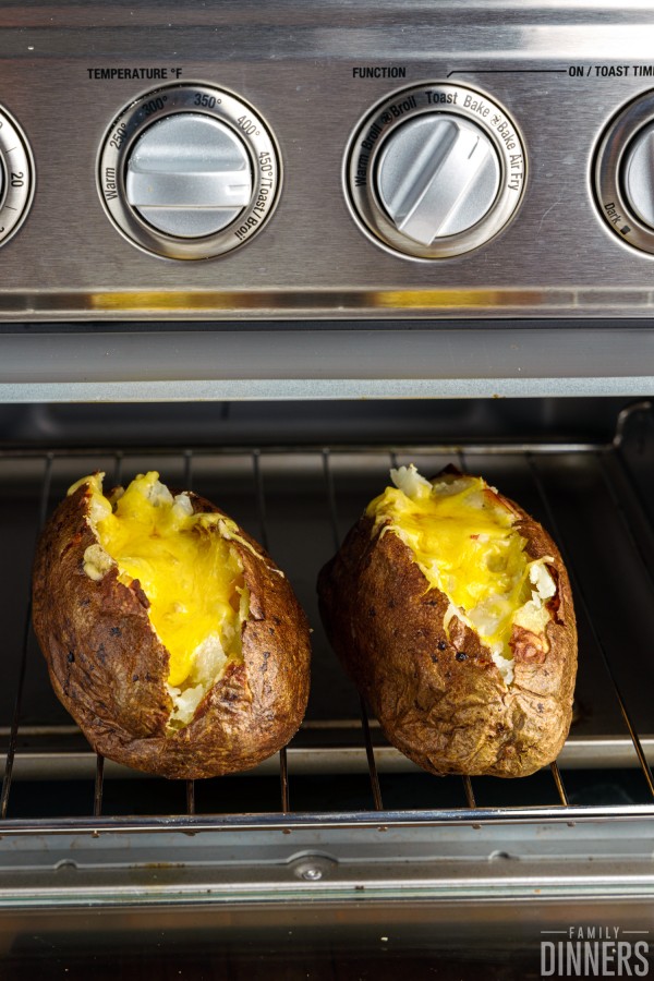 melted cheese on toaster oven baked potatoes