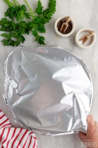 cast iron can covered in foil