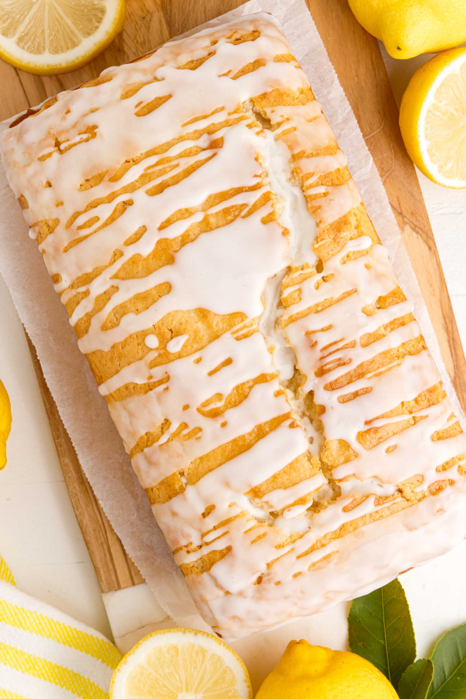 Sliced lemon bread with lemon glaze.