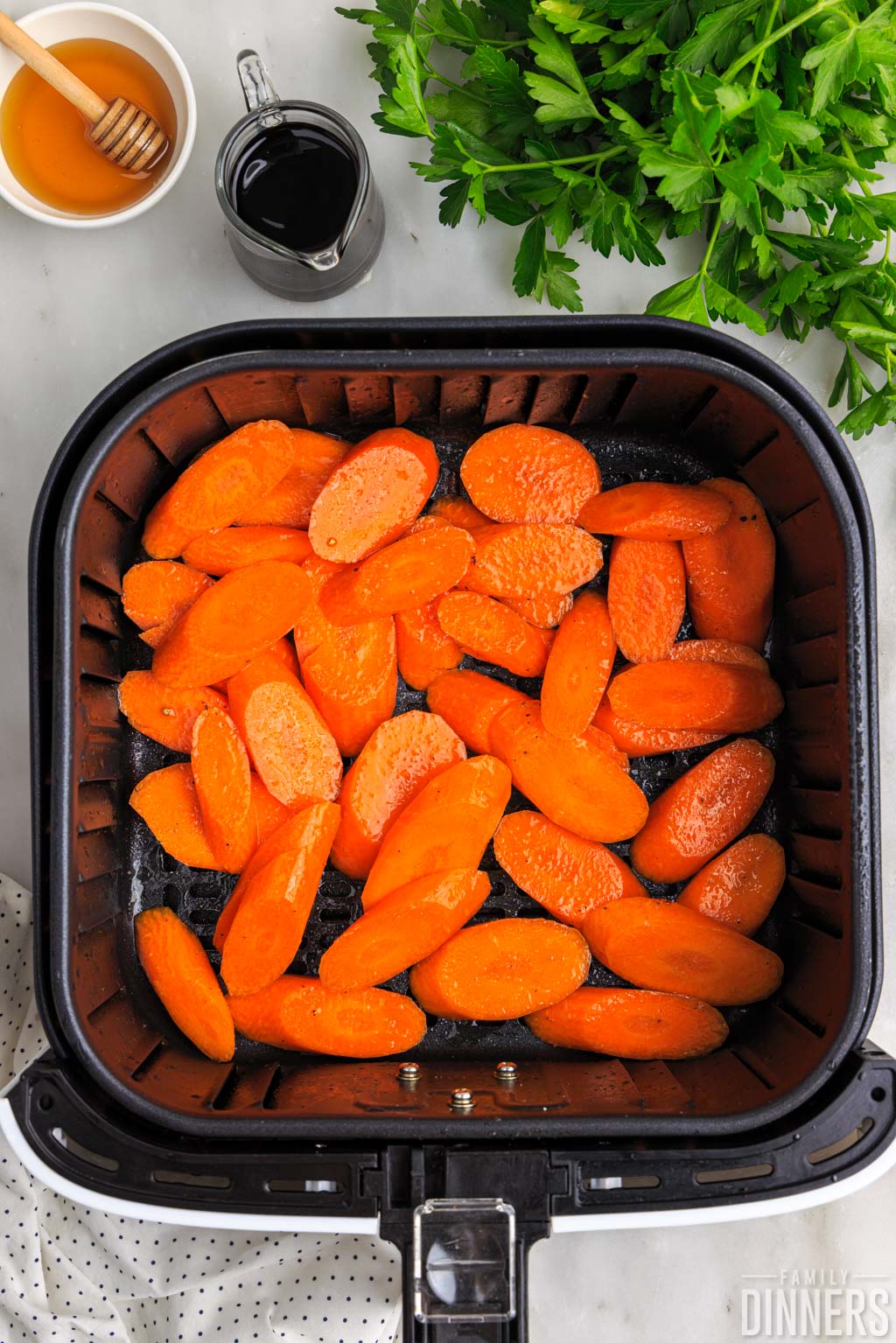 Carrots slices in the air fryer.