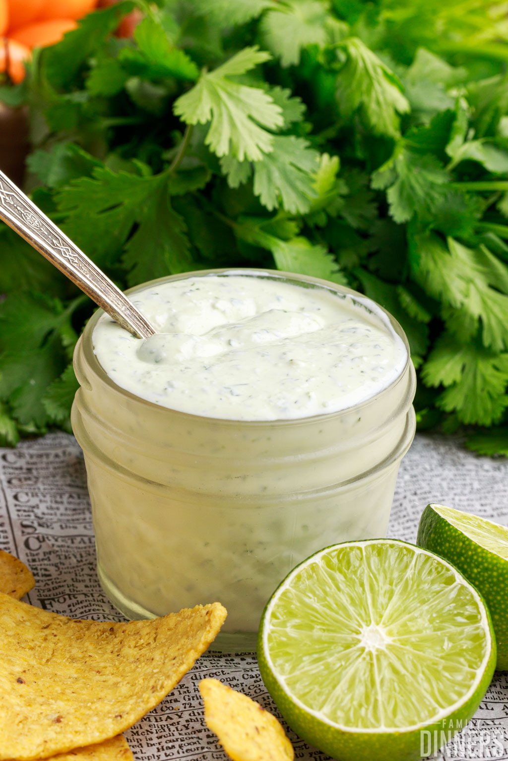 Homemade cilantro lime sour cream in a mason jar.