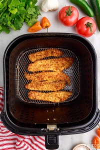 Cooked fish in an air fryer.