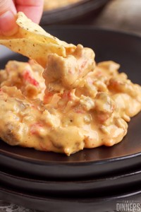 chip dipped into warm rotel dip