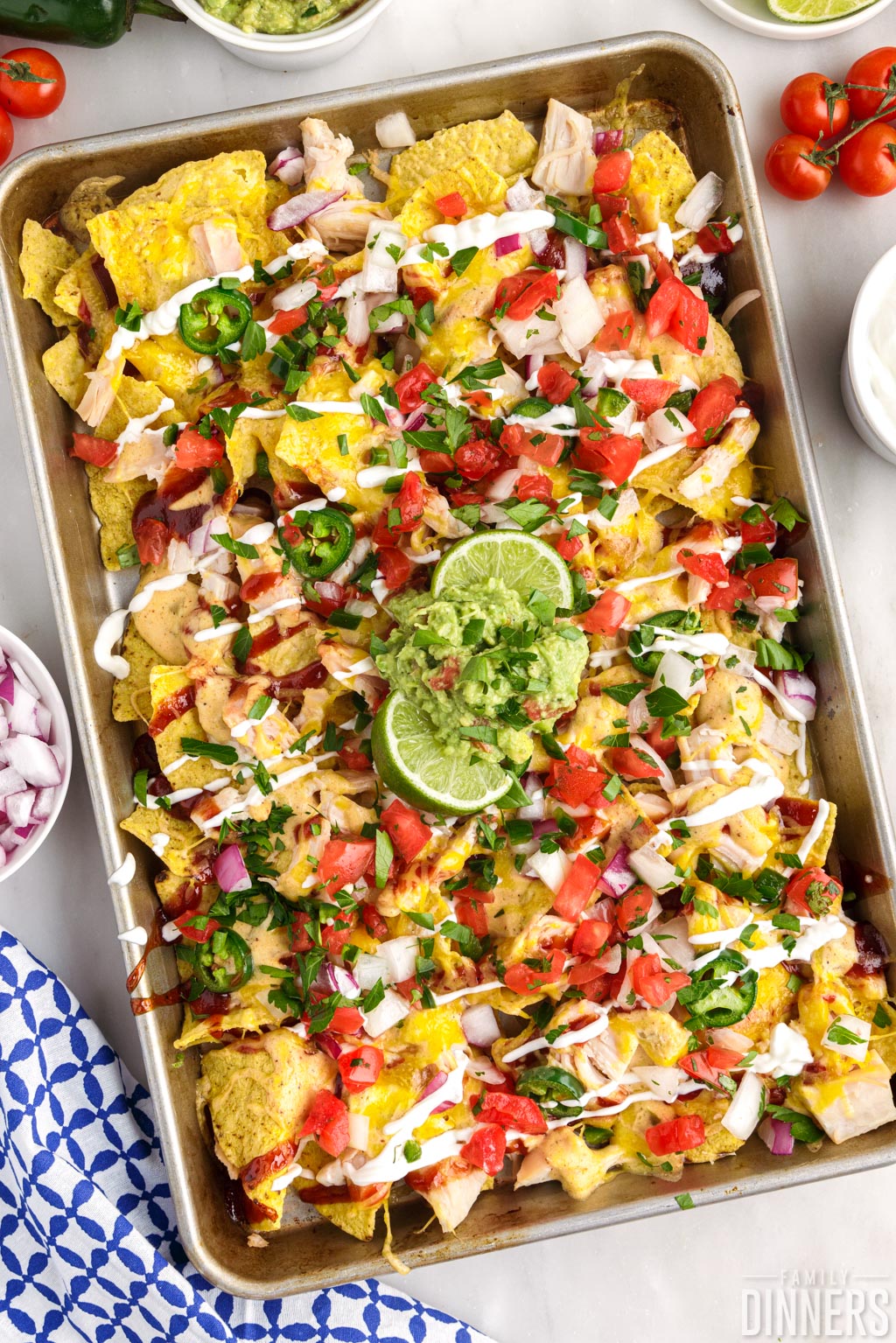 BBQ chicken nachos on a sheet pan.