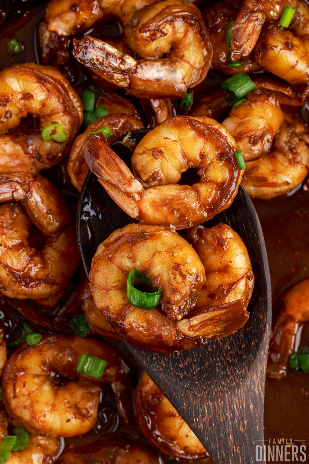 Close up of shrimp on a wooden spoon