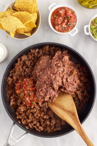 Ground beef with refried beans and restaurant style salsa.