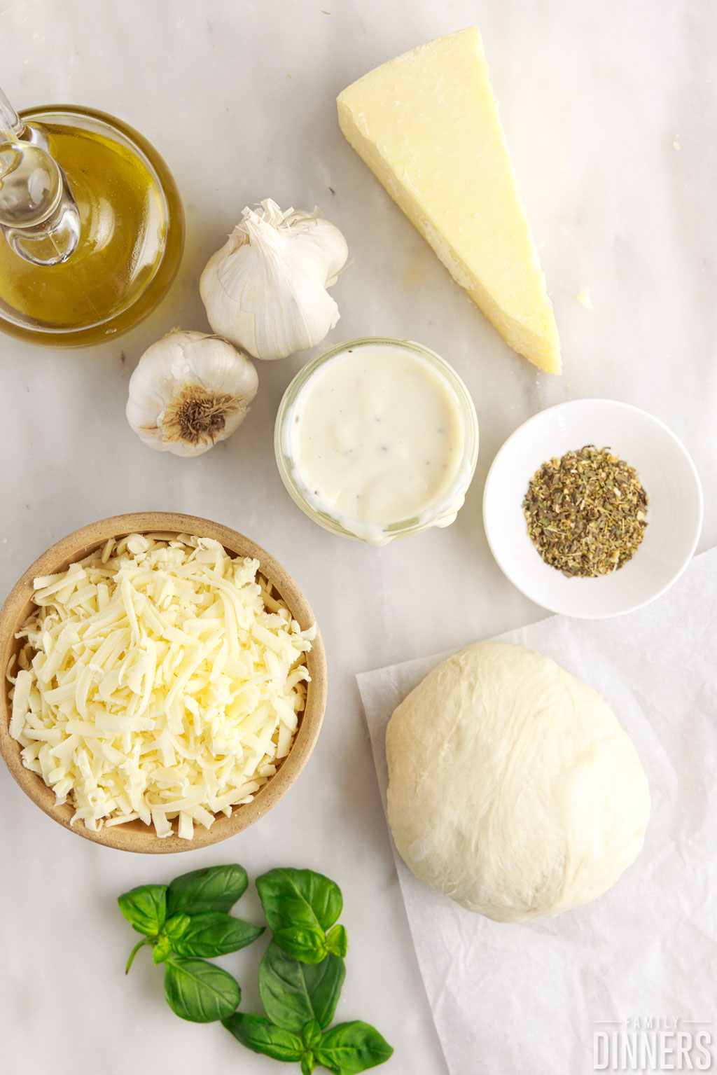 ingredients for white pizza with garlic pizza sauce