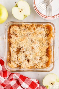Cooked apple crisp without oats in a baking dish.