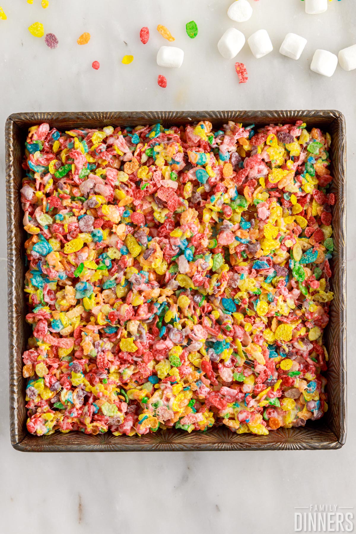 Fruity Pebbles in a baking dish.