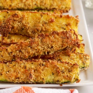 stack of zucchini fries on a plate.