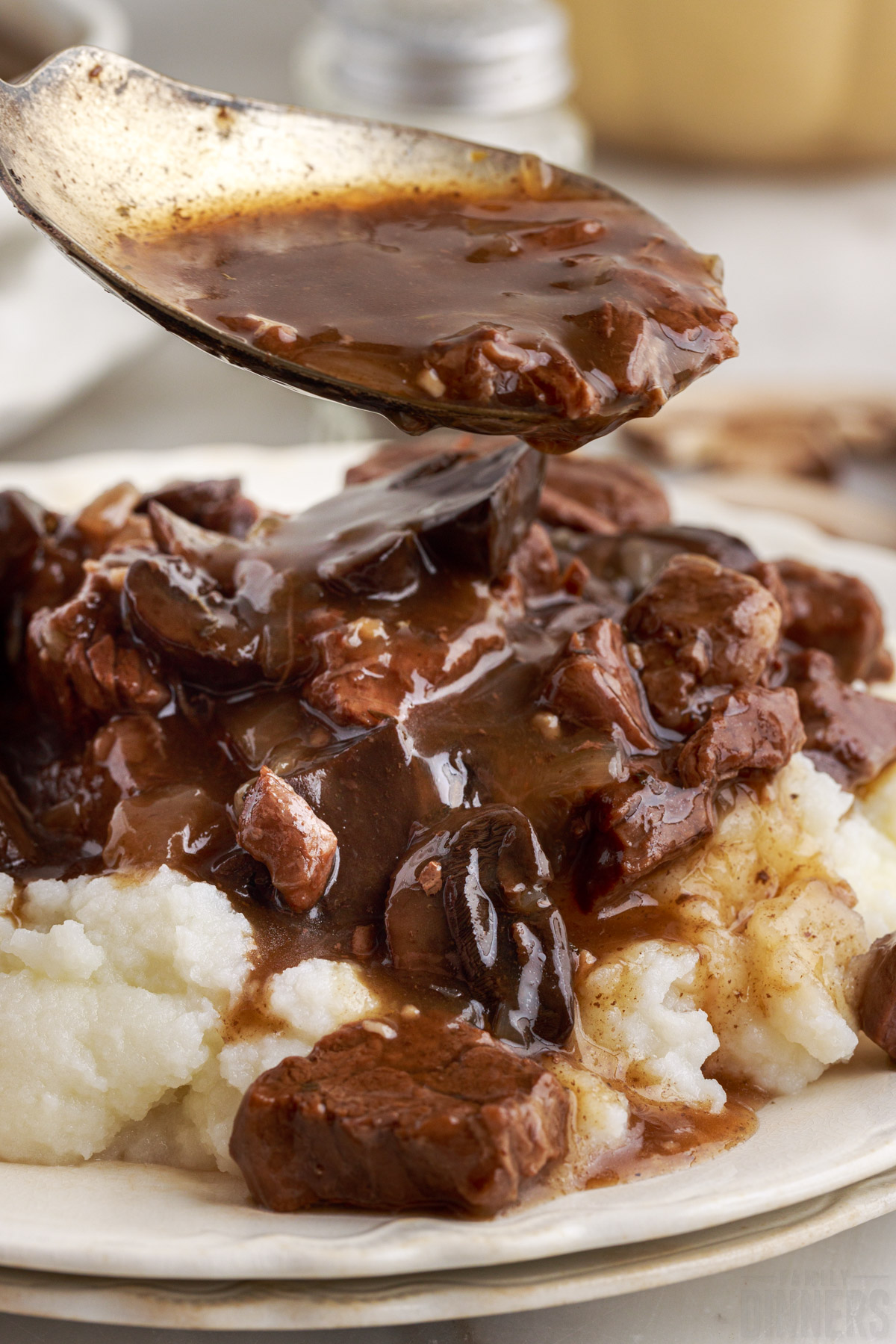Instant Pot beef tips over mashed potatoes.