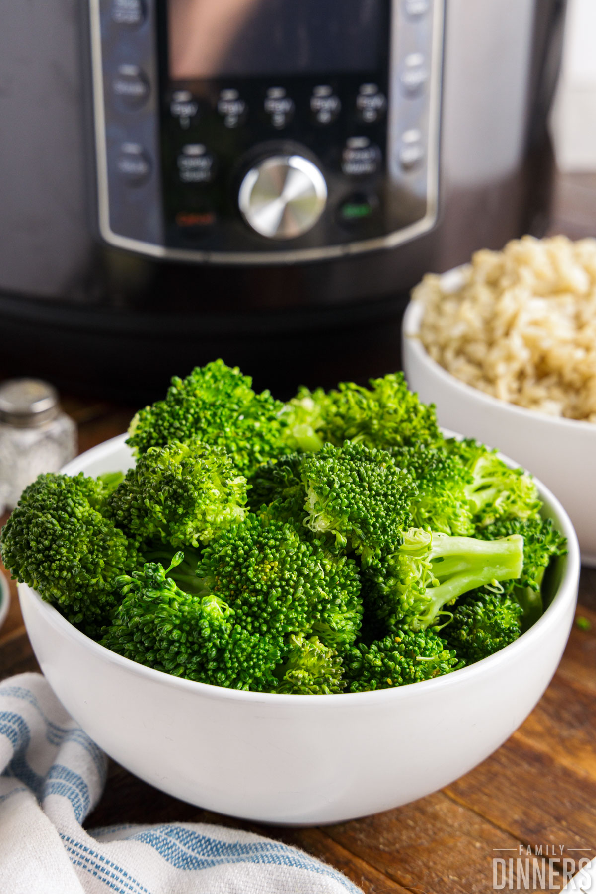 bowl full of broccoli in front of an Instant Pot